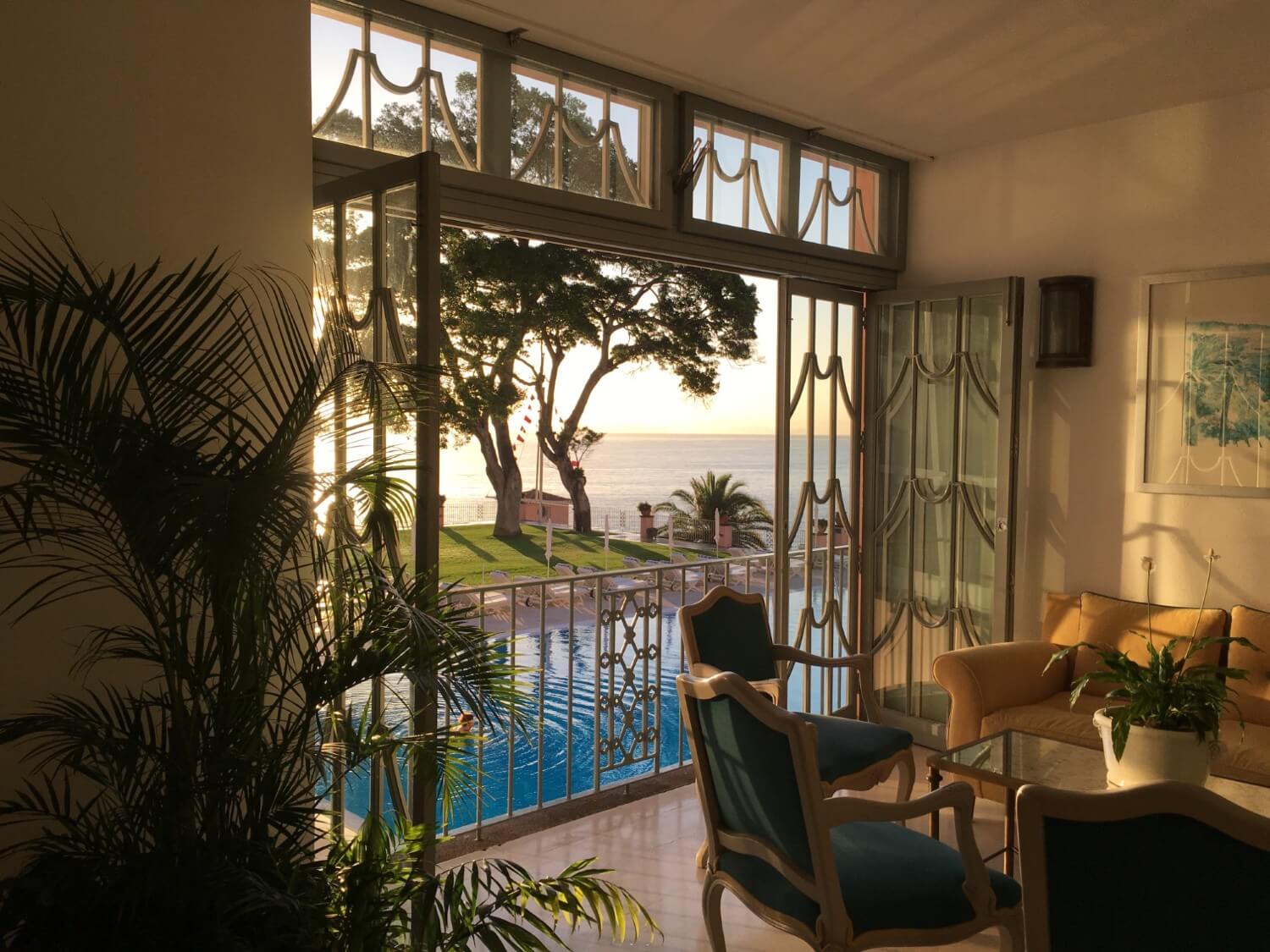 view-through-an-open-window-to-swimming-pool-garde-2025-03-10-05-49-19-utc