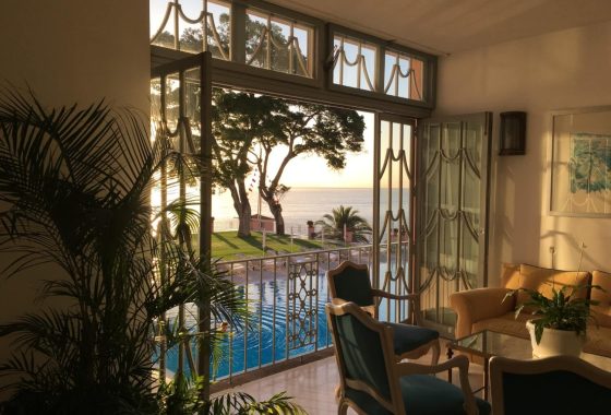 view-through-an-open-window-to-swimming-pool-garde-2025-03-10-05-49-19-utc